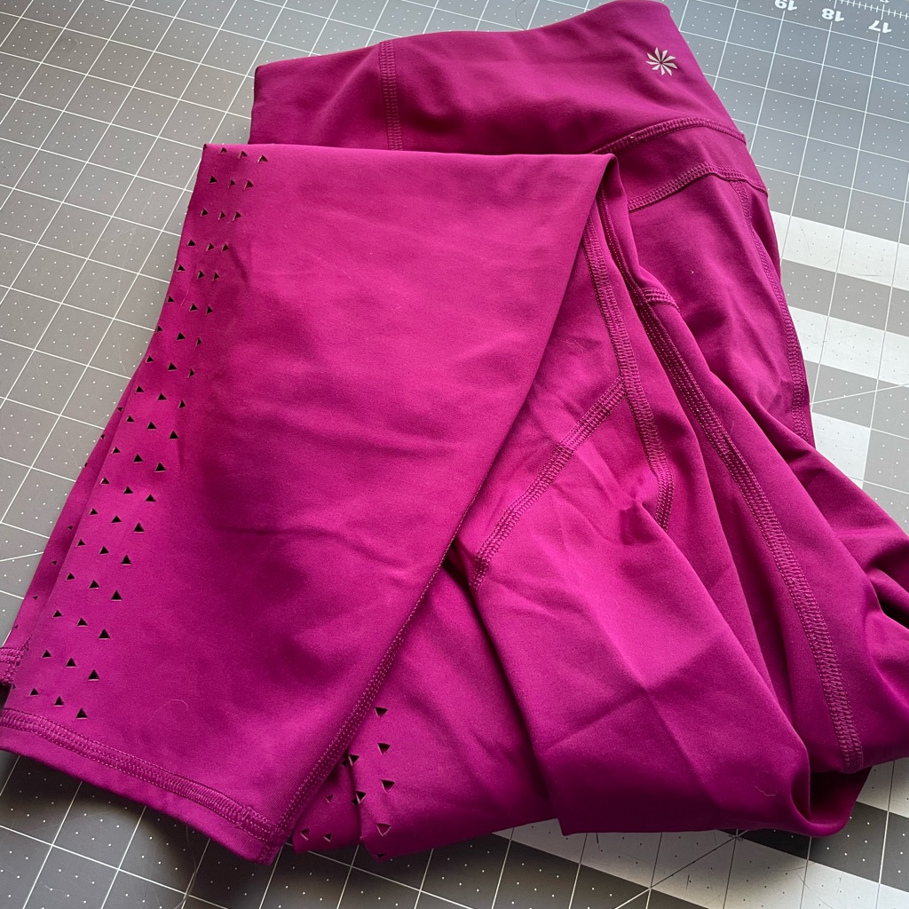 Lt Athleta Leggings With Pockets And Laser Cuts On Calf.